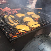 Bascom Catering's Kelston manning the grill at The Art of TATS CRU Block Party Celebration