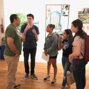 BIO speaking with students at The Art of TATS CRU Preview Reception